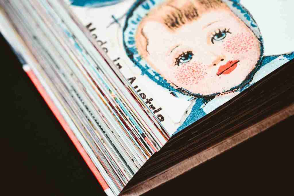 Old image of a baby on a magazine cover.