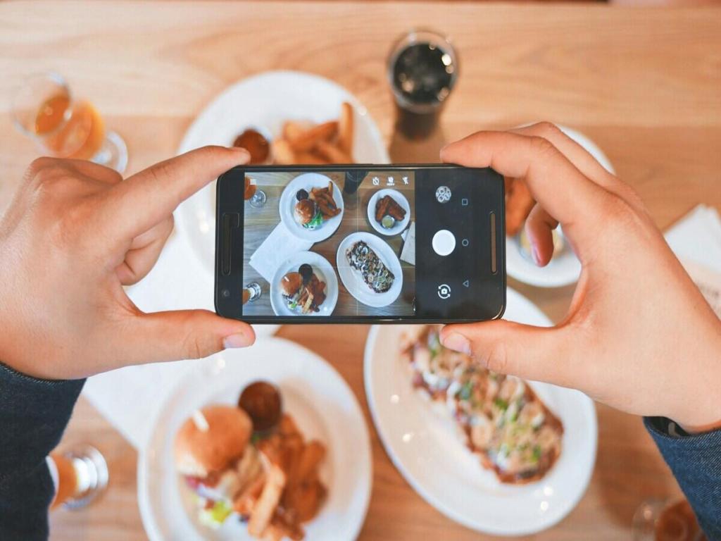 A person taking a photo of their food.