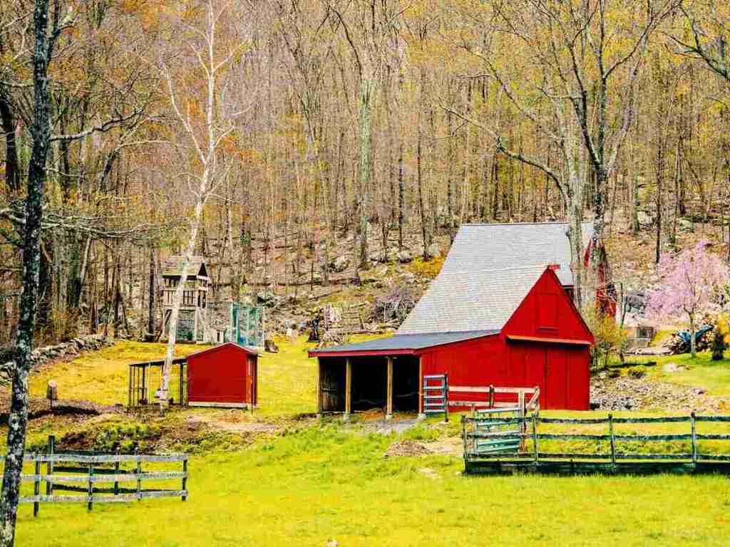 Red wooden house in the nature.