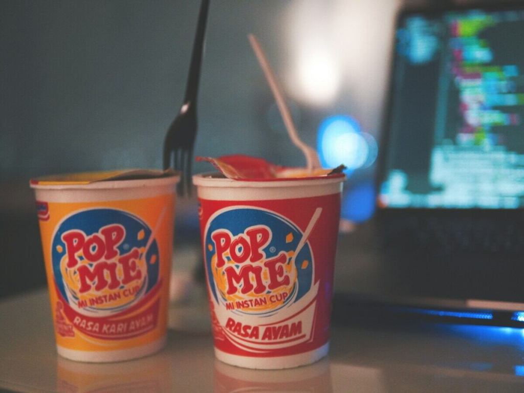 Two cups of instant noodles.