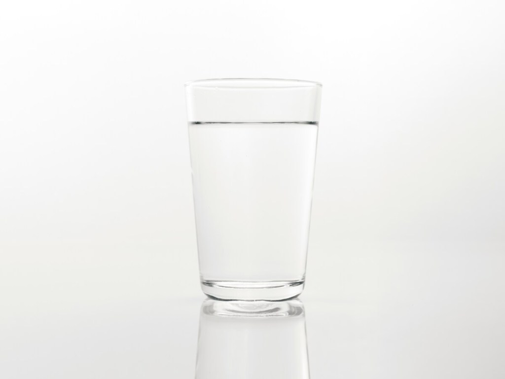 A glass of water.