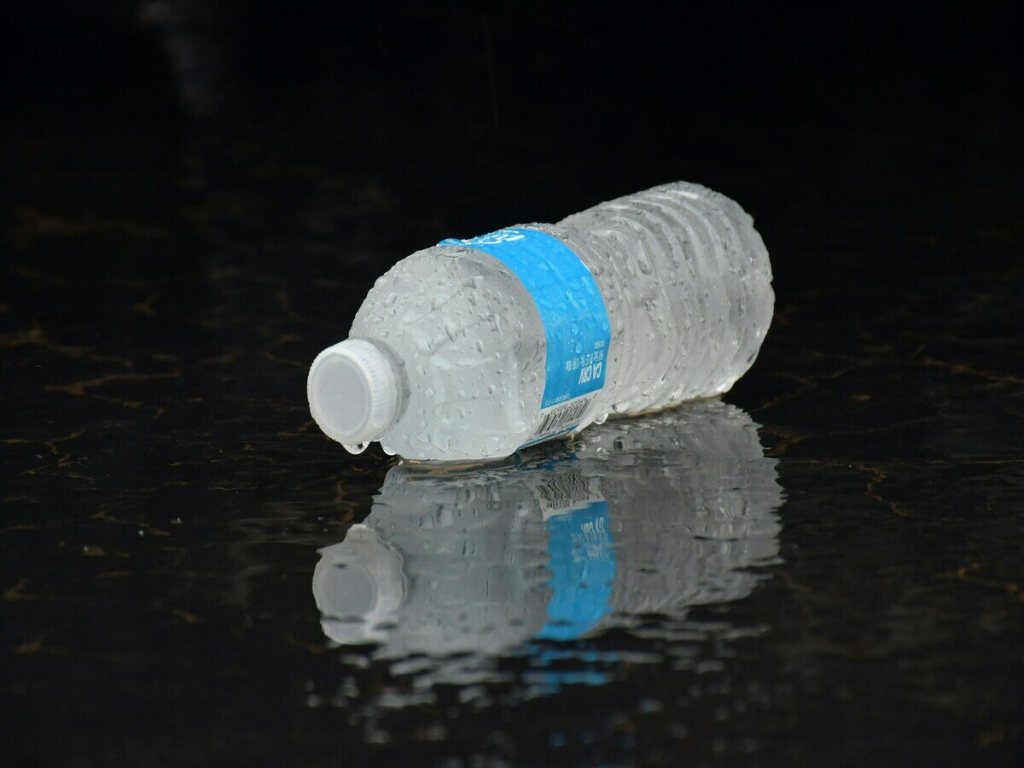 A bottle of water on its side.