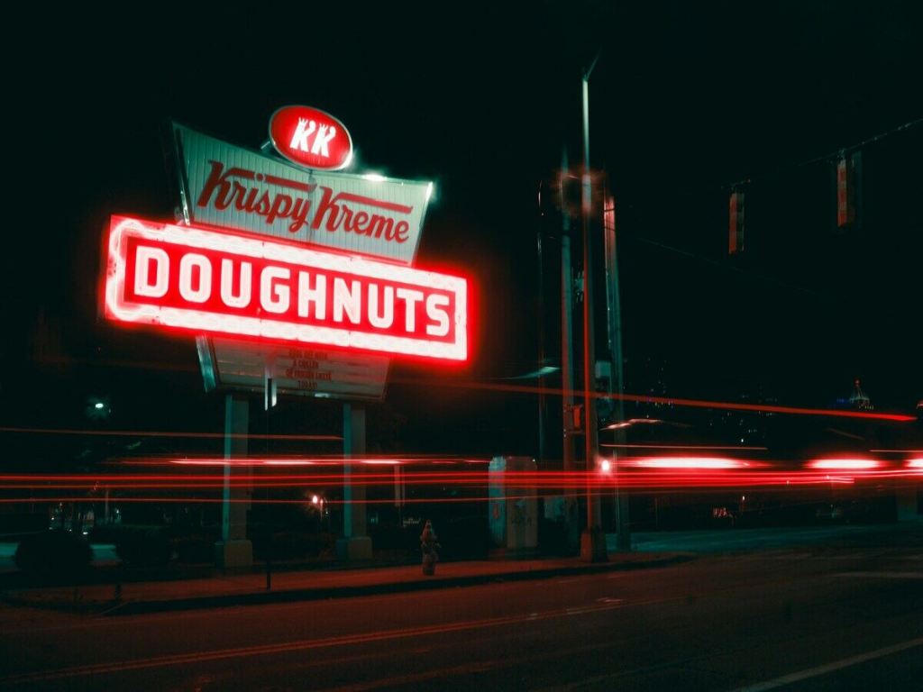 The outside of a Krispy Kreme restaurant.