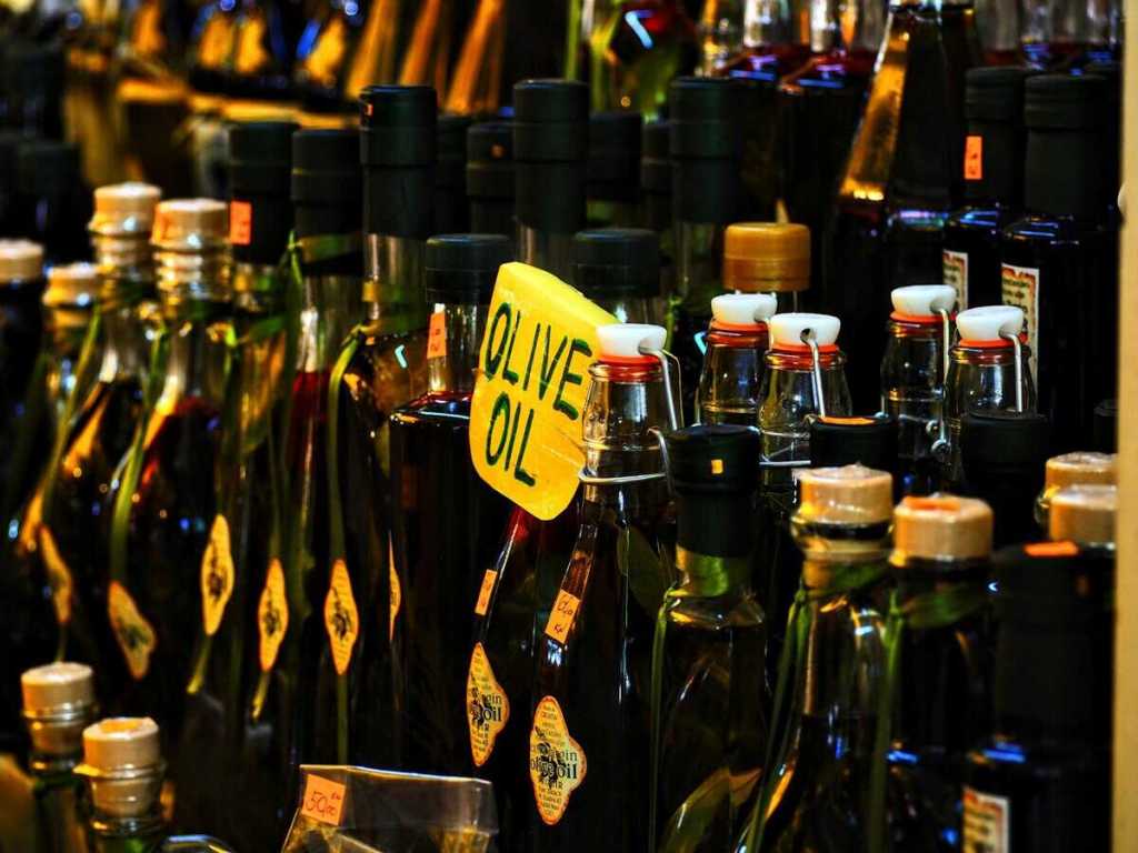 Bottles of olive oil for sale.